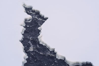 High angle view of ice on water