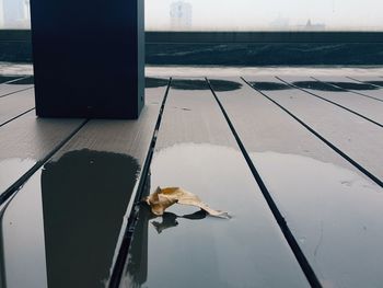 High angle view of swimming on pool by lake