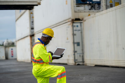 Man working on mobile phone