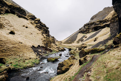 Scenic view of rock formations against sky