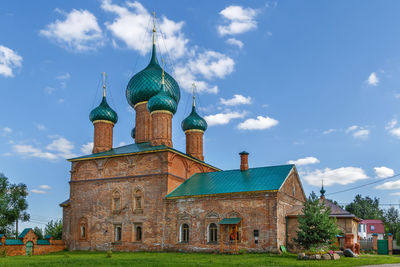 Old temple building against sky