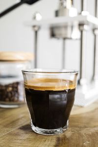 Close-up of coffee cup on table