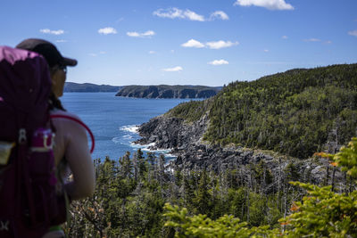 Young backpacker looks back on east coast trail in newfoundland