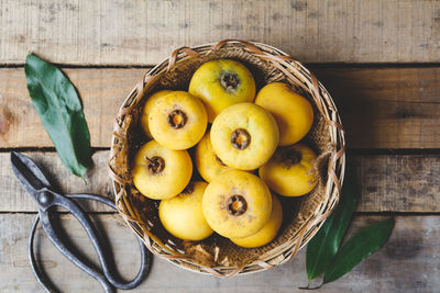 High angle view of fruits in basket on table