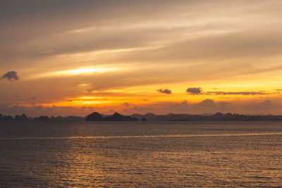 Scenic view of sea against romantic sky during sunset