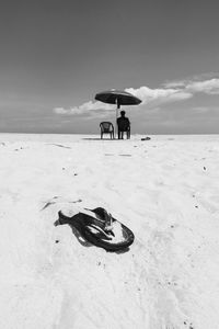 Man on beach during winter