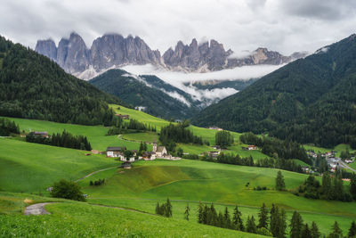 Scenic view of landscape and mountains against sky