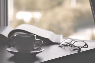 Close-up of coffee cup on table