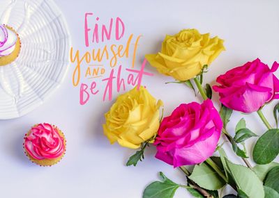 High angle view of multi colored roses on table