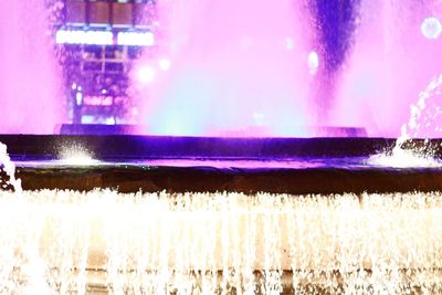 Close-up of illuminated water at night