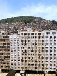 Buildings in city against sky