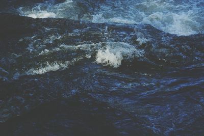 Full frame shot of rocks in sea