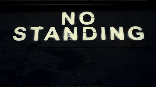 Close-up of information sign