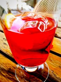 Close-up of red drink on table