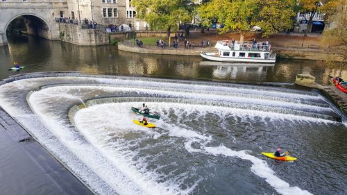 High angle view of people on boat in river