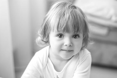 Portrait of cute baby at home