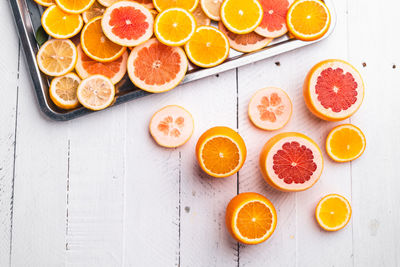 High angle view of orange fruits on table