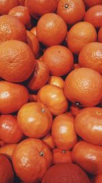 Full frame shot of oranges in market