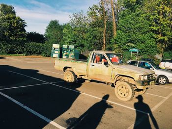 Cars on road against sky