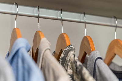 Close-up of clothes hanging on rack