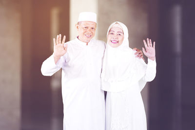 Portrait of a smiling young couple