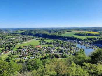 High angle view of landscape against clear blue sky