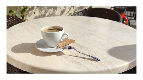 Coffee cup on table