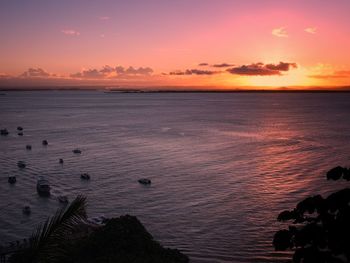 Scenic view of sea against orange sky