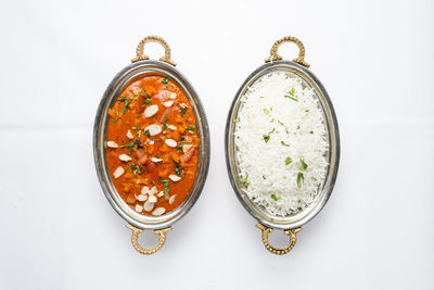 High angle view of lemon served on table against white background