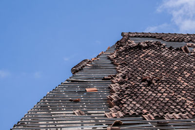 Low angle view of roof of building against sky