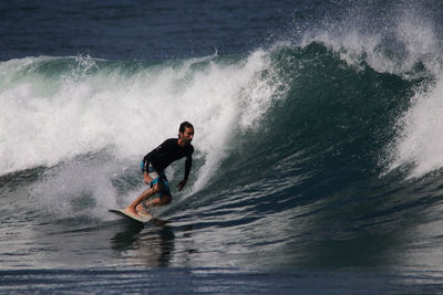 Man surfing in sea