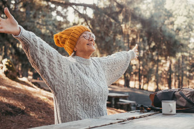Rear view of man working at park