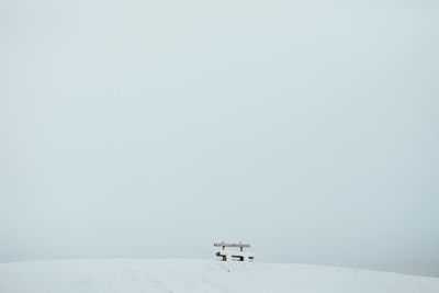 Scenic view of snow against clear sky