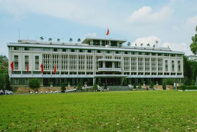 View of building in field against sky