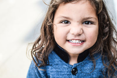 Close-up portrait of smiling girl