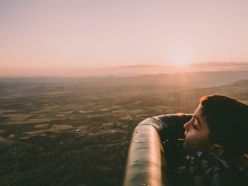 Scenic view of landscape against sky during sunset