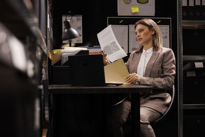 Young woman using laptop