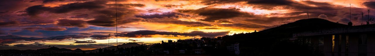 Scenic view of dramatic sky at sunset