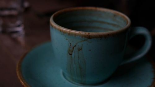 Close-up of coffee cup on table