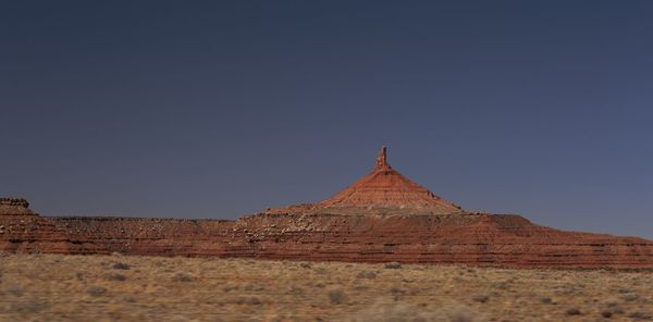 View of desert against clear sky