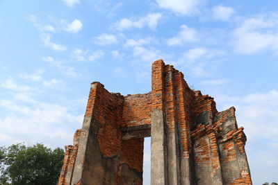 Low angle view of old building against sky