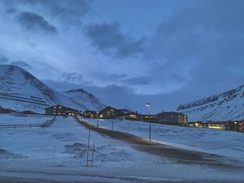 Scenic view of snow covered mountain against sky