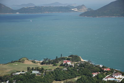 High angle view of town by sea