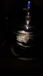 High angle view of illuminated light bulb on table