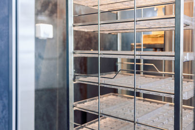 Shelving with molds for pouring chocolates. manufacturin for automatic production of chocolate. 