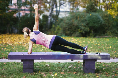 People walking on grassy field