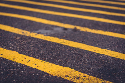 High angle view of road markings on street