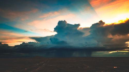 Stormy sun rays at sunset