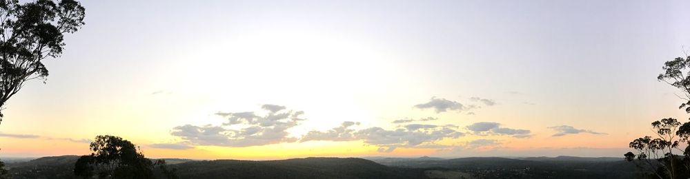 Scenic view of mountains against sky during sunset