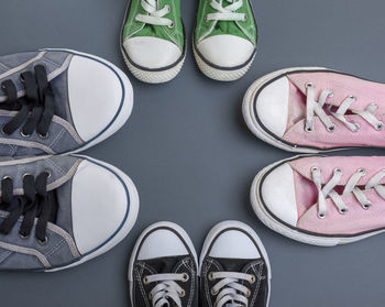 Various shoes on gray floor